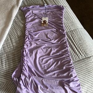 Color lavender, strapless kind of long